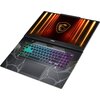 Laptop z kolorową klawiaturą podświetlaną w różnych barwach, z widocznym logo "MSI" nad klawiaturą. Na ekranie wyświetlone jest logo w kształcie tarczy z motywem smoka na tle pomarańczowych linii.