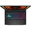 Laptop z podświetlaną klawiaturą w różnych kolorach, widziany z góry, z otwartym ekranem, na którym widoczne są pomarańczowe i czerwone światła. Na obudowie nad klawiaturą znajduje się logo producenta.