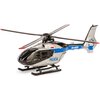 Na zdjęciu znajduje się model helikoptera ratunkowego w kolorach srebrnym, niebieskim i czarnym, z widocznym napisem "POLICJA" oraz oznaczeniem "SN-80XP". Na kadłubie helikoptera znajduje się także flaga Polski oraz napis "EC135".