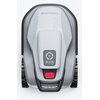 Na zdjęciu widoczny jest robot koszący w kolorze szarym z czarnymi elementami, posiadający przycisk z napisem "STOP" oraz panel z ikonami i przyciskiem z symbolem włączania. Na obudowie znajduje się napis "TERRAMOW V1000".