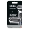 Opakowanie produktu z napisem "BRAUN Shaver Head Series 7 Get back 100% performance*" oraz grafiką przedstawiającą folię i blok ostrzy do golarek. Na dole opakowania znajduje się informacja "Replace every 18 months" oraz "Made in Germany" z flagą Niemiec.