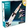 Pudełko z klockami drewnianymi BRIO przedstawia model rakiety Apollo Saturn V na tle kosmosu. Na opakowaniu widnieje napis "BRIO Builder Apollo Saturn V 34607", oznaczenie wiekowe "3+", logo FSC oraz ostrzeżenie: "WARNING: CHOKING HAZARD - Small parts. No