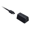 Na zdjęciu widoczny jest czarny kabel z wtyczką USB-C z napisem "RAZER" oraz czarny adapter z logo Razer i napisem "HYPERSPEED WIRELESS". Adapter ma kształt prostopadłościanu z zaokrąglonymi krawędziami.