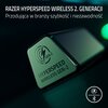 Na zdjęciu widoczny jest zielony element z logo "GEN-2" oraz napisem "HYPERSPEED WIRELESS GEN-2". W górnej części obrazu znajduje się tekst: "RAZER HYPERSPEED WIRELESS 2. GENERACJI Przodująca w branży szybkość i niezawodność".