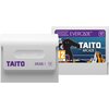 Na zdjęciu znajduje się biały kartridż z napisem "TAITO ARCADE 1" oraz numerem "17", obok którego widoczna jest okładka z napisem "EVERCADE" i grafiką przedstawiającą sylwetkę potwora na tle gór. Na okładce znajduje się również oznaczenie wiekowe "12" ora