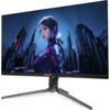 Na zdjęciu widoczny jest monitor z wyświetlanym obrazem przedstawiającym postać w futurystycznym stroju na tle miejskiego krajobrazu. Na dolnej ramce monitora znajduje się logo "PREDATOR".