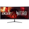 Monitor o zakrzywionym ekranie wyświetla grafikę z czerwonym smokiem i postacią na tle krajobrazu, z dużymi napisami "acer" i "NITRO". Na dolnej ramce monitora widoczne jest logo "acer".