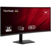 Monitor ViewSonic z zakrzywionym ekranem o przekątnej 34 cale, wyświetla informacje: "2K UWQHD", "120 Hz", "USB-C" oraz logo ViewSonic. Tło ekranu jest czerwone z geometrycznymi wzorami.