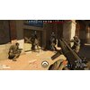 Na zdjęciu widać scenę z gry "Tom Clancy's Rainbow Six Siege X - Elite Edition" na konsolę XBOX ONE / XBOX SERIES X, przedstawiającą grupę postaci w taktycznym umundurowaniu przed zamkniętymi drzwiami. Na ekranie widoczne są różne elementy interfejsu użyt