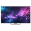 Na zdjęciu widoczny jest telewizor z wyświetlonym obrazem przedstawiającym kolorową galaktykę w odcieniach fioletu, różu i niebieskiego. Na dolnej ramce telewizora znajduje się logo "HAIER".