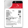 Srebrny dysk twardy z etykietą zawierającą logo "SEAGATE" oraz napis "IronWolf Pro" z grafiką wilka. Na etykiecie widnieje oznaczenie "30TB IronWolf Pro" oraz różne informacje techniczne i certyfikaty, w tym kody QR i symbole zgodności.