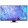 Telewizor z dużym ekranem wyświetla abstrakcyjny, kolorowy wzór w odcieniach niebieskiego i fioletowego. W lewym górnym rogu widoczne jest logo "SAMSUNG", a w prawym dolnym rogu napis "QLED".