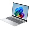 Srebrny laptop z wyświetlaczem OLED, na którym widoczny jest kolorowy ekran startowy systemu Windows 11. Na obudowie znajduje się logo HP, a klawiatura jest pełnowymiarowa z ciemnoszarymi klawiszami.