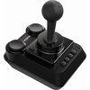 Czarny joystick z trzema przyciskami i kolorowym logo "C64" na podstawie. Urządzenie ma klasyczny design z dużą gałką sterującą.
