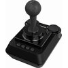 Czarny joystick z czterema przyciskami na podstawie i jednym dużym przyciskiem obok drążka, z widocznym logo "C64 Mini" na górnej części. Urządzenie ma matowe wykończenie i prostokątną podstawę.
