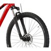 Czarno-czerwony rower górski z widocznym przednim kołem, amortyzatorem i tarczą hamulcową. Na oponie widoczny jest napis "SCHWALBE", a na amortyzatorze logo "KROSS".