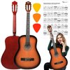 Na zdjęciu znajduje się gitara klasyczna w kolorze sunburst, trzy kolorowe kostki gitarowe oraz tabela z najważniejszymi akordami gitarowymi. W prawym górnym rogu widnieje logo "media expert".