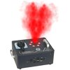 Czarna wytwornica dymu z metalowymi uchwytami emituje czerwony dym. Na urządzeniu widoczny jest napis "LIGHT4ME Vesu 1200W V2" oraz kilka czerwonych diod.