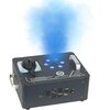 Czarna wytwornica dymu z metalowymi uchwytami emituje niebieski dym, a na jej górnej powierzchni znajduje się sześć niebieskich diod LED. Widoczny jest napis "LIGHT4ME VESU 1200W V2" oraz ostrzeżenia dotyczące użytkowania urządzenia.