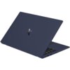 Na zdjęciu widoczny jest otwarty laptop w ciemnym kolorze, z widocznym logo w kształcie litery "X" na pokrywie. Klawiatura jest częściowo widoczna, a obudowa ma minimalistyczny design.