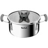 Srebrny garnek z przezroczystą pokrywką i czarnym uchwytem, na którym widnieje logo "Tefal". Garnek ma dwa uchwyty pokryte szarym materiałem.