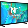 Telewizor z kolorowym ekranem wyświetla tekst: "SAMSUNG Nr 1 NA ŚWIECIE Najczęściej kupowane telewizory od 19 lat" oraz "HD TV".