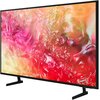 Telewizor z cienką ramką wyświetla kolorowy, abstrakcyjny wzór w odcieniach różu, czerwieni i pomarańczu. Urządzenie stoi na dwóch prostych nóżkach.