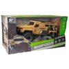 Pudełko zawiera zdalnie sterowany samochód terenowy w kolorze piaskowym z napisem "ARMY" na boku, a na opakowaniu widnieje tekst "BIGFOOT LEGEND" oraz informacje "1:8 SCALE", "2.4 GHz", "8+ Ages". W tle opakowania znajduje się grafika przedstawiająca górs