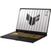 Laptop z otwartym ekranem, na którym widoczny jest wzór z literą "V" oraz napisy "TUF" i "STAY TOUGH". Klawiatura podświetlona na żółto, obudowa w ciemnym kolorze.