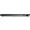 Srebrny laptop widziany z boku, z zamkniętą pokrywą, posiadający porty USB i czytnik kart. Urządzenie ma smukły profil i minimalistyczny design.