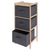 Na zdjęciu znajduje się trzypoziomowy regał z drewnianą ramą i trzema czarnymi, materiałowymi szufladami z uchwytami. Produkt opisany jest jako "Regał STORAGE SOLUTIONS 3-poziomowy 27,5 × 25,4 × 65 cm".