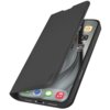 Czarne etui typu wallet book na smartfon z widocznym logo "sbs" na klapce, częściowo otwarte, ukazujące ekran telefonu z ikonami aplikacji. Na ekranie widoczne są ikony aplikacji takich jak Home, Watch, Utilities oraz inne standardowe aplikacje.