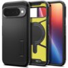 Na zdjęciu widoczne jest czarne etui SPIGEN Tough Armor Mag MagSafe do Google Pixel 10 / 10 Pro, składające się z trzech części, z których jedna ma żółte wnętrze z okrągłym wycięciem. Na etui znajduje się napis "SPIGEN" oraz "TOUGH ARMOR".