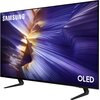 Telewizor z cienką ramką wyświetla dynamiczny obraz w odcieniach fioletu i złota. Na ekranie widoczne są napisy "SAMSUNG" i "OLED".