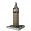 Na zdjęciu znajduje się model 3D wieży zegarowej, przypominający Big Ben, z widocznymi detalami architektonicznymi i tarczami zegara. Podstawa modelu jest ozdobiona grafiką przedstawiającą fragment ulicy, a na froncie podstawy widnieje napis "BIG BEN".
