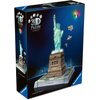 Pudełko przedstawia model 3D Statuy Wolności z efektem świetlnym LED, z napisem "3D Puzzle Iconics" oraz "Statue of Liberty". Na opakowaniu widoczne jest logo "Ravensburger".