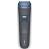 Na zdjęciu znajduje się trymer w kolorze ciemnoszarym z niebieskimi elementami, z widocznym napisem "0.5-10MM" na górze oraz "PHILIPS Beard Trimmer" i "Wet & Dry" na dole. Na urządzeniu znajduje się również przycisk zasilania oraz suwak z oznaczeniami dłu
