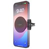 Na zdjęciu znajduje się smartfon z wyświetlaczem pokazującym godzinę 9:40 oraz ikonę ładowania z napisem "Charging" i wskaźnikiem baterii naładowanym do 100%. Do telefonu przymocowany jest czarny uchwyt samochodowy z widocznym napisem "FIXED".