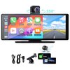 Na zdjęciu znajduje się tablet z kolorowym interfejsem, na którym widoczne są ikony aplikacji takich jak Phone, Music, Maps, Messages, Now Playing, SmartScreen, Pldcasts, Audiobooks oraz obraz drogi z niebem. Obok tabletu znajdują się akcesoria: kamera, u