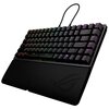 Na zdjęciu znajduje się klawiatura mechaniczna z podświetleniem RGB, z widocznym logo ROG na podpórce na nadgarstki. Klawisze są oznaczone literami i symbolami, a podświetlenie mieni się różnymi kolorami.