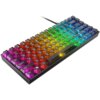Na zdjęciu znajduje się klawiatura mechaniczna z podświetleniem RGB, z klawiszami w układzie QWERTY. Klawisze są podświetlone w różnych kolorach, tworząc efekt tęczy.