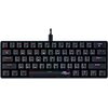 Czarna klawiatura mechaniczna z podświetleniem RGB, posiadająca klawisze z oznaczeniami w języku angielskim oraz logo "Froggiex" na spacji. Na klawiszach widoczne są dodatkowe funkcje, takie jak multimedia i sterowanie podświetleniem.