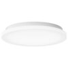 Na zdjęciu znajduje się okrągła, biała lampa sufitowa o gładkiej powierzchni. Lampa ma minimalistyczny design z delikatnie zaokrąglonymi krawędziami.