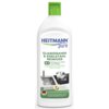 Biała butelka z zieloną nakrętką, na której widnieje napis "HEITMANN pure GLASKERAMIK & EDELSTAHL REINIGER 3in1 Reinigung, Glanz und Pflege GLASS CERAMIC & STAINLESS STEEL CLEANER". Na etykiecie znajduje się również zdjęcie zlewu i płyty indukcyjnej oraz 
