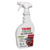 Biała butelka ze spryskiwaczem zawiera etykietę z napisem "TRI-BIO natural GRILL & BBQ CLEANER" oraz grafiką grilla. Na etykiecie widnieją również informacje: "no ammonia, no perfumes, no colorants, odor-free, biodegradable" oraz oznaczenie "VEGAN Recomme