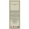 Etykieta produktu zawiera tekst: "Sandalwood, Coconut Milk, Violet, Cardamom" oraz ostrzeżenia w języku angielskim i polskim dotyczące łatwopalności i reakcji alergicznych. Na dole znajdują się symbole ostrzegawcze oraz informacje o składnikach i producen