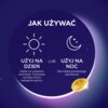 Na ciemnym tle znajduje się instrukcja użycia produktu z ikonami słońca i księżyca oraz tekstem: "JAK UŻYWAĆ. UŻYJ NA DZIEŃ: Nałóż na wilgotne końcówki. Pozostaw na kilka minut, następnie spłucz. LUB UŻYJ NA NOC: Dla intensywniejszego nawilżenia." Widoczn