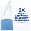 Na zdjęciu widoczna jest szklanka z niebieskim płynem oraz pipeta, a obok znajduje się tekst: "2x więcej aktywnych składników ochronnych". Na dole małym drukiem: "* W porównaniu z kolekcją Deep Cleanse".