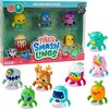Na zdjęciu znajduje się opakowanie z napisem "Piñata Smashlings" oraz "Smashlings Pack", zawierające sześć kolorowych figurek w różnych kształtach i wzorach. Na opakowaniu widnieje również napis "Epic Figure Hidden Inside" oraz "DLC Code Included", a poni