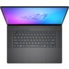 Na zdjęciu widoczny jest otwarty laptop z podświetlaną klawiaturą i ekranem wyświetlającym gradient od niebieskiego do fioletowego. Na ekranie znajduje się logo w kształcie stylizowanej litery "R".